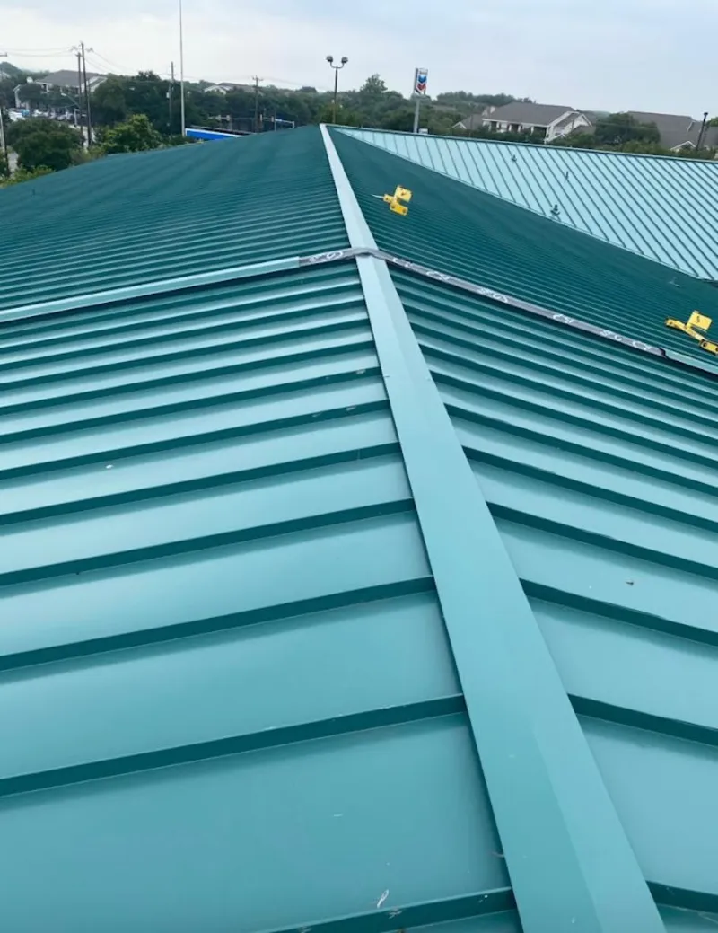 Green commercial metal roof ridge and valley for Metal Roof Repair in Riverside